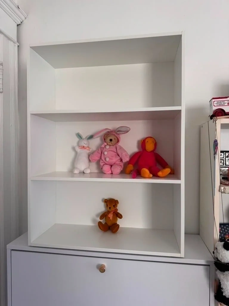 White 3-tier bookshelf assembled and mounted cleanly on desk unit - Pleasantville NY