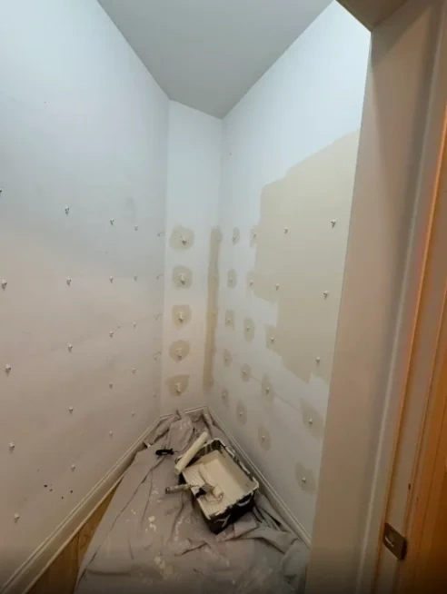 Closet wall patching and prep before shelving installation - Armonk NY
