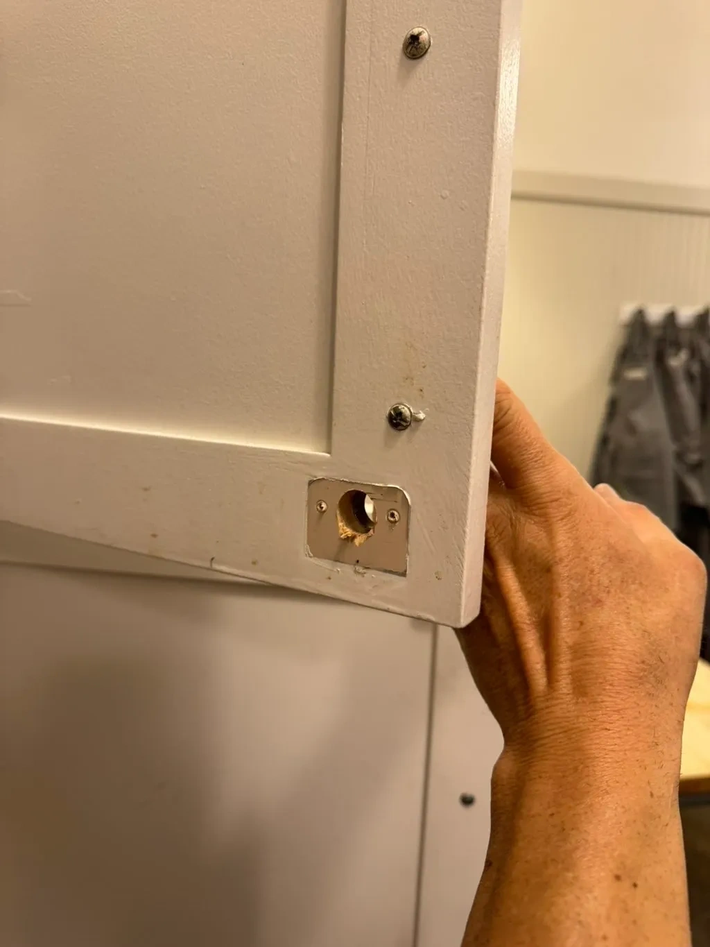 Commercial retail cabinet door with missing lock cylinder and drilled lock hole - New Rochelle NY
