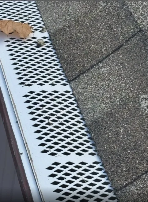 Aluminum mesh gutter guards installed on roof gutters - Chappaqua NY