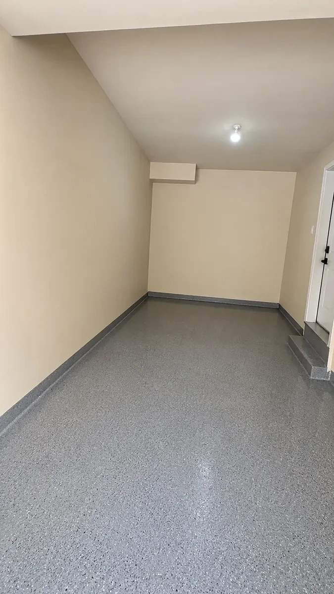 Clean organized garage after shelving installation