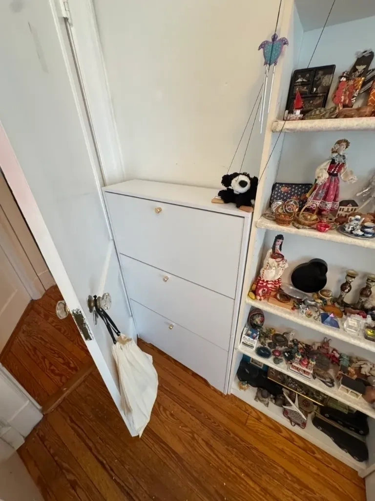 IKEA shoe cabinet built and anchored safely to hallway wall - Chappaqua NY