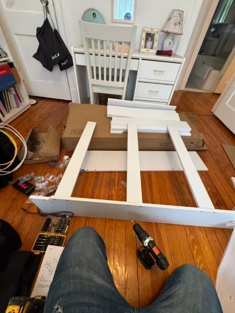 IKEA shoe cabinet flat pack parts laid out before assembly - Chappaqua NY
