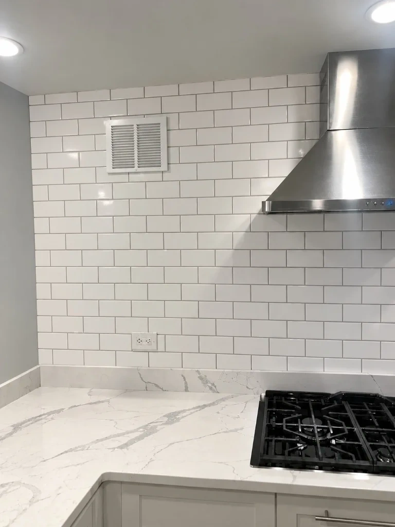 Blank white subway tile kitchen backsplash wall before floating shelves installation - Bronxville NY