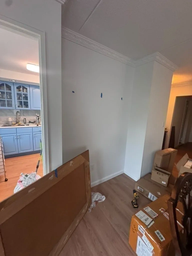Living room wall alcove prepped for large wall mirror hanging - Larchmont NY
