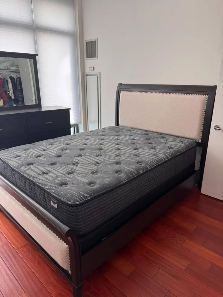 Fully assembled dark wood bed frame with upholstered nailhead trim headboard and mattress - Purchase NY