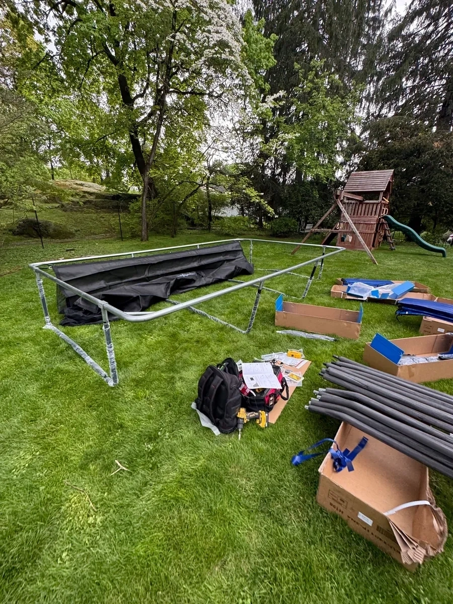 Trampoline parts unpacked before assembly - Scarsdale NY