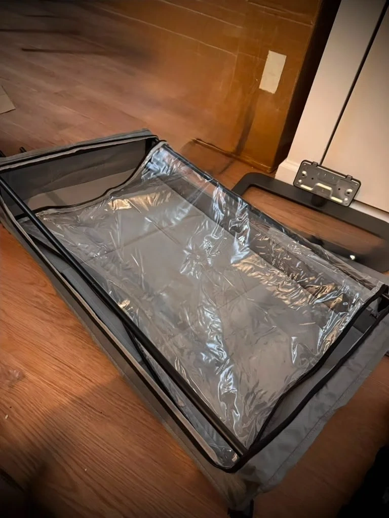 Assembled rolling underbed storage bin with wheels and clear zippered PVC top - Harrison NY