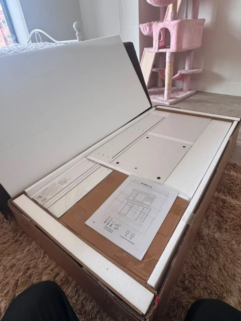Flat pack vanity desk panels and manual unpacked before assembly - Tarrytown NY
