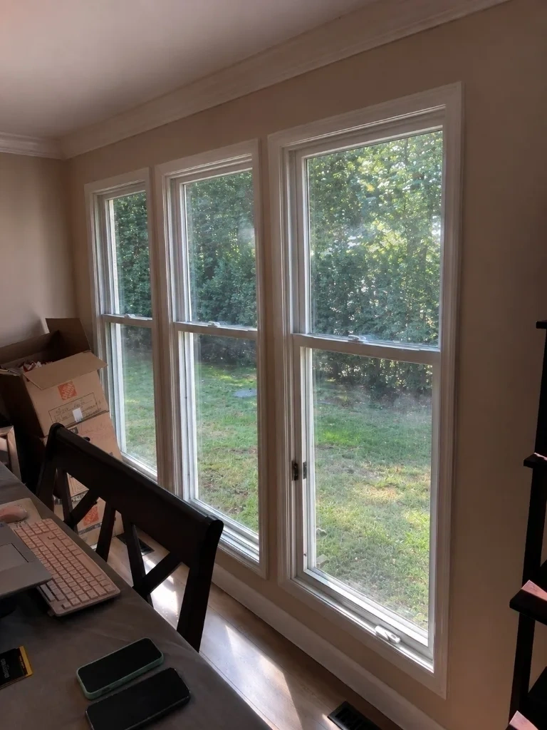 Bare triple window casing before horizontal window blinds installation - Scarsdale NY
