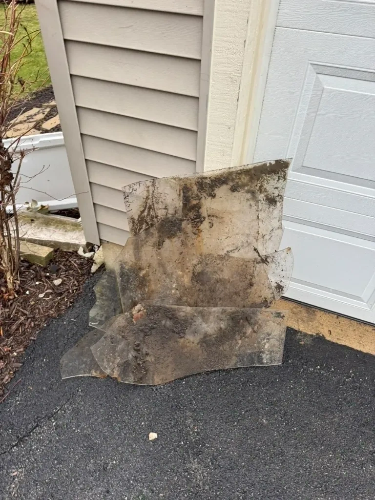 Unprotected window well before cover installation - Bedford NY
