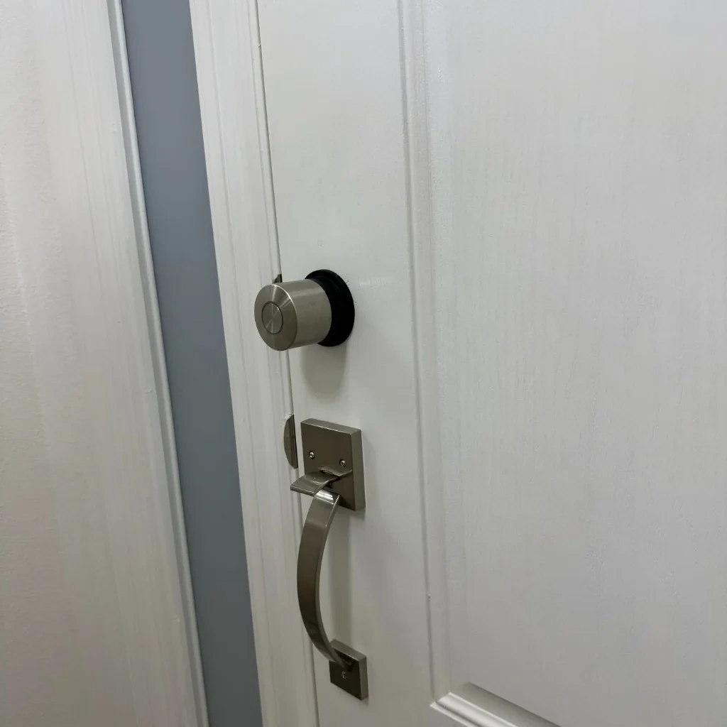 Front door hardware and smart deadbolt lock installation in Scarsdale NY